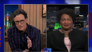 Voting champion Stacey Abrams tells Stephen Colbert to bet blue in tomorrow's Georgia runoff
